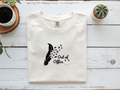 "Out of Office" Feather & Birds Graphic Tee – Comfort Colors® Premium Cotton